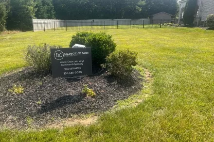 circle mc fencing yard sign in yard of customer in greensboro nc